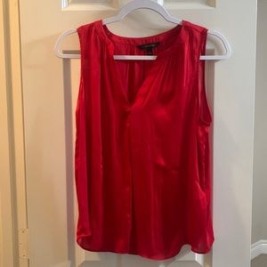 Red sleeveless shirt
